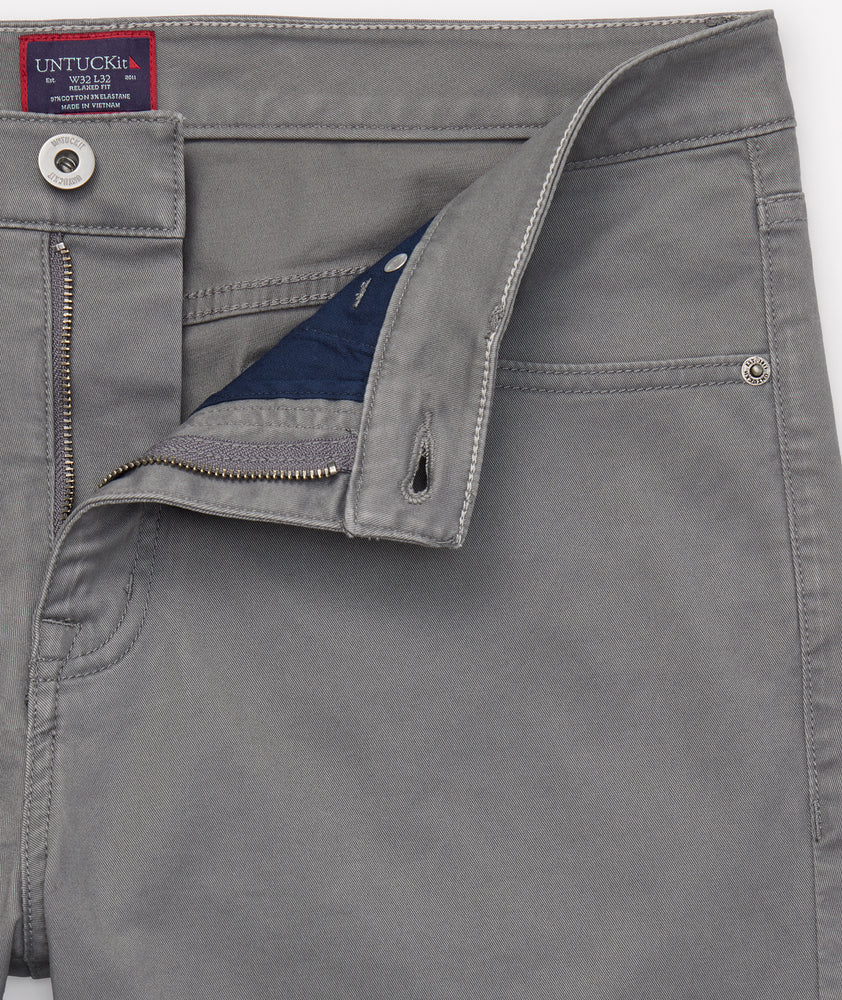 Model is wearing UNTUCKit 5-Pocket Chino Pants in Charcoal.