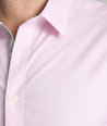 Model is wearing UNTUCKit Douro wrinkle-free shirt. 