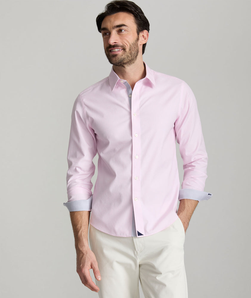 Model is wearing UNTUCKit Douro wrinkle-free shirt. 