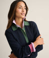 Model is wearing UNTUCKit Cotton-Cashmere Edyta Sweater Polo in navy. 