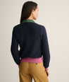 Model is wearing UNTUCKit Cotton-Cashmere Edyta Sweater Polo in navy. 