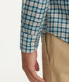 Model is wearing UNTUCKit Wrinkle-Free Elrond Shirt in White & Navy Check