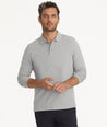 Model is wearing UNTUCKit Elvria Long sleeve polo in heather grey. 