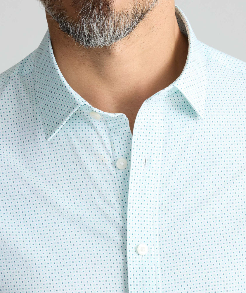 Model is wearing UNTUCKit Performance Fairfax Shirt. 
