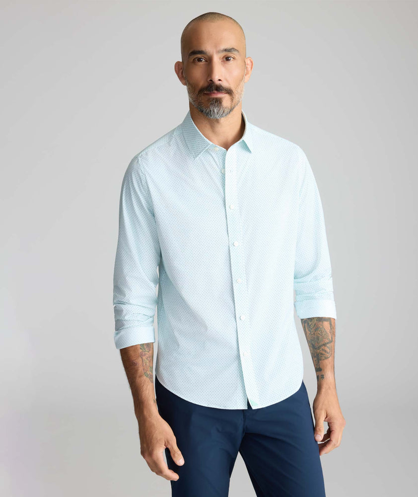 Model is wearing UNTUCKit Performance Fairfax Shirt. 