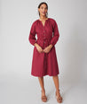 Model is wearing UNTUCKit  Farrah dress in red. 