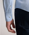 Model is wearing UNTUCKit Farnsworth in vintage wash solid ultramarine. 