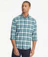 Model is wearing UNTUCKit Wrinkle-Free Performance Flannel Ferney Shirt in teal plaid.