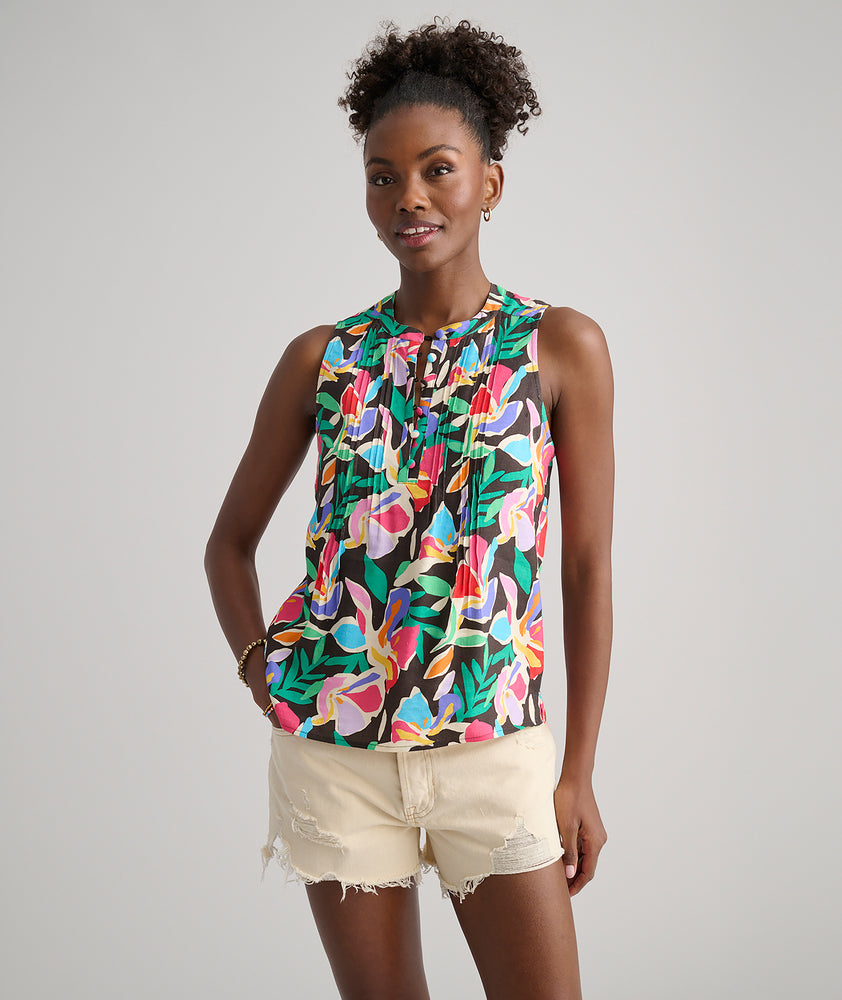 Model is wearing UNTUCKit Frida shirt in printed floral.