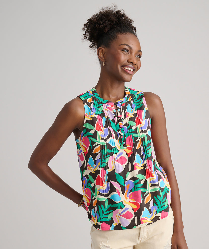 Model is wearing UNTUCKit Frida shirt in printed floral.