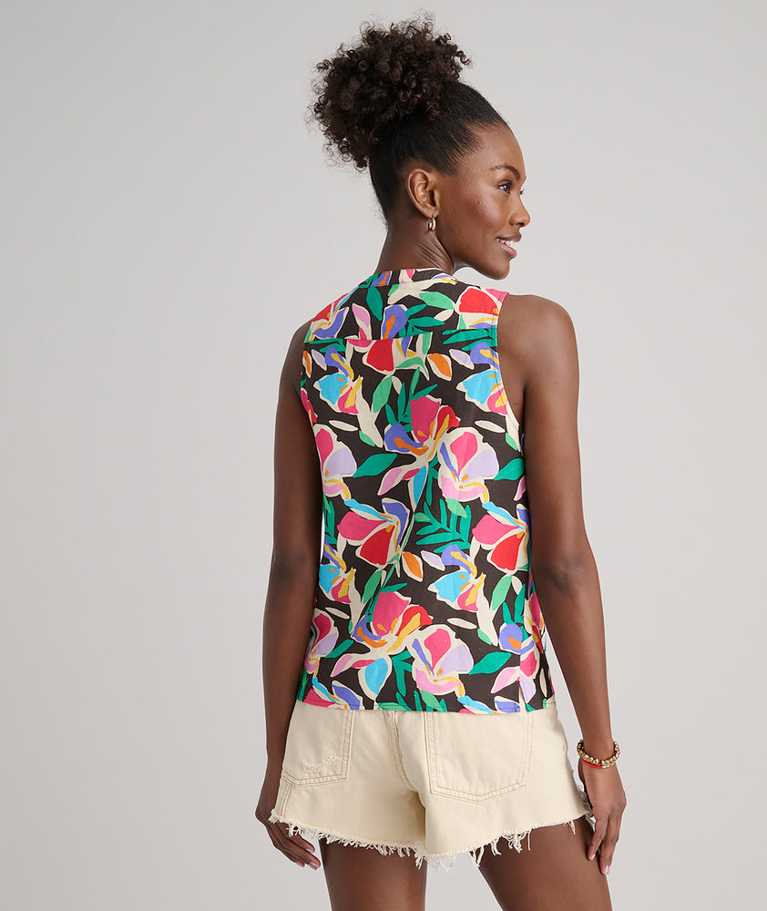 Model is wearing UNTUCKit Frida shirt in printed floral.