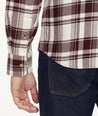 Model is wearing UNTUCKit Plaid Flannel Shirt White Grounded With Maroon Plaid | Fair Trade Certified™.