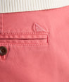 Model is wearing UNTUCKit 9" Stretch Chino Shorts in red. 