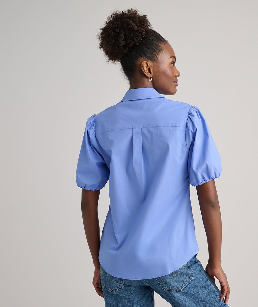 Model is wearing UNTUCKit Gail shirt.