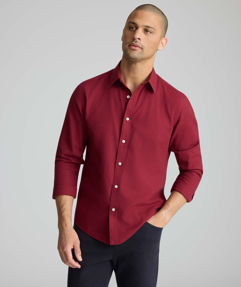 Model wearing an UNTUCKit Wrinkle-Free Gallis Shirt in red.