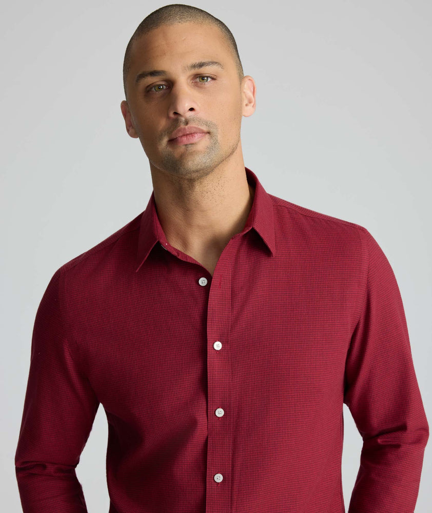 Model wearing an UNTUCKit Wrinkle-Free Gallis Shirt in red.