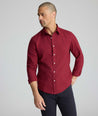 Model wearing an UNTUCKit Wrinkle-Free Gallis Shirt in red.