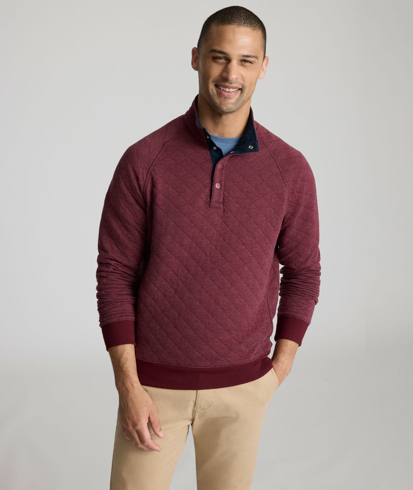Model is wearing UNTUCKit Garrison Quilted Pullover  in Tawny Port.