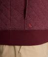 Model is wearing UNTUCKit Garrison Quilted Pullover  in Tawny Port.