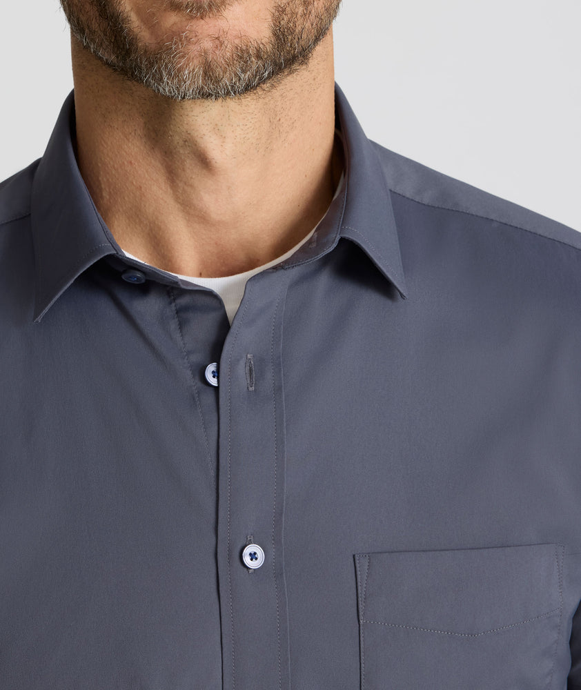 Model is wearing UNTUCKit Performance Short-Sleeve Grionde Shirt.