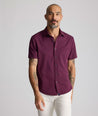 Model is wearing UNTUCKit Performance Gironde Shirt in fig. 