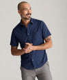 Model is wearing UNTUCKit Gironde shirt.