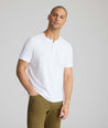 Model wearing a white short-sleeve henley