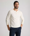 Model is wearing UNTUCKit Marastina henley in Vanilla Ice.