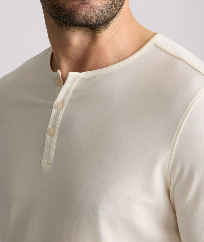 Model is wearing UNTUCKit Marastina henley in Vanilla Ice.