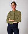 Model is wearing UNTUCKit Gloria shirt in olive.