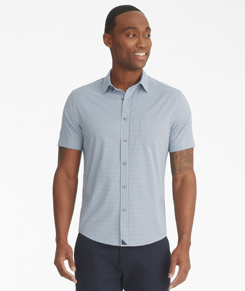 Model is wearing UNTUCKit Godello short-sleeve button down.