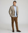Model is wearing UNTICKit Italian Wool Blend Graydy Sport Coat in Tan Windowpane Check. 