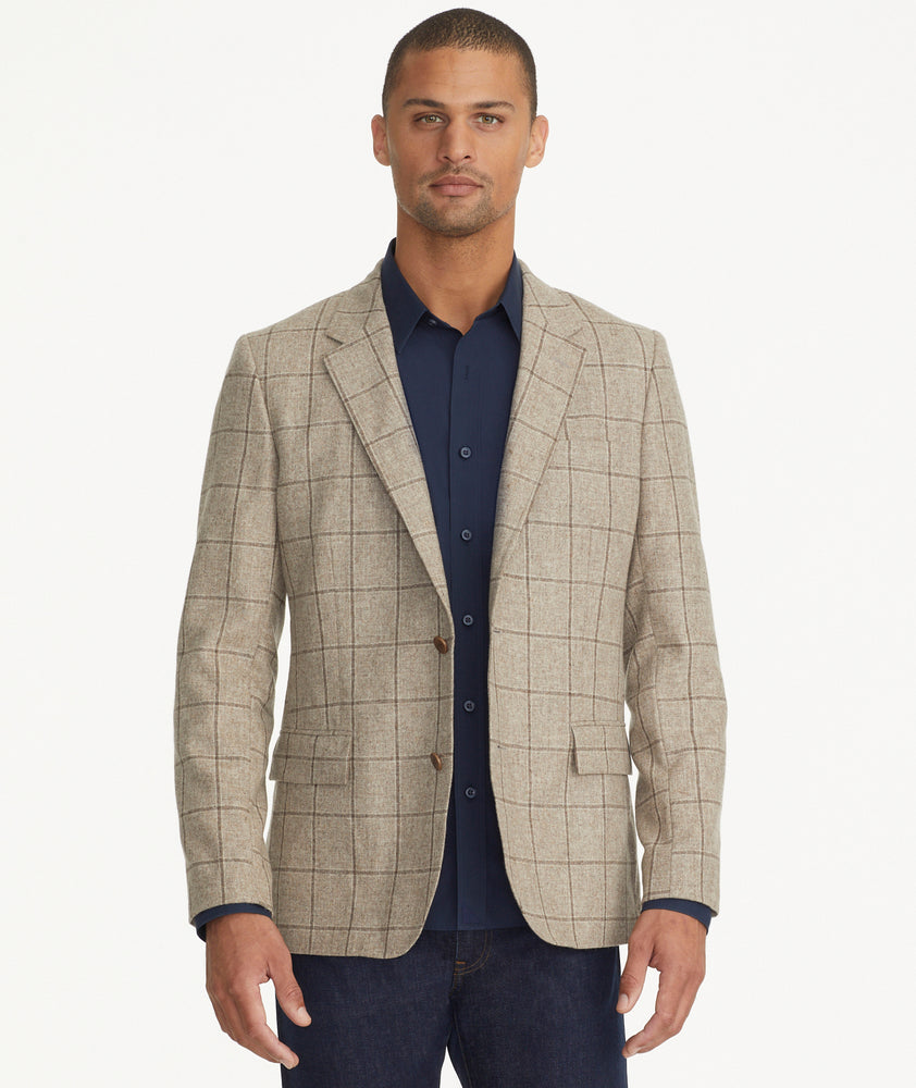 Model is wearing UNTICKit Italian Wool Blend Graydy Sport Coat in Tan Windowpane Check.
