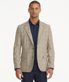 Model is wearing UNTICKit Italian Wool Blend Graydy Sport Coat in Tan Windowpane Check.
