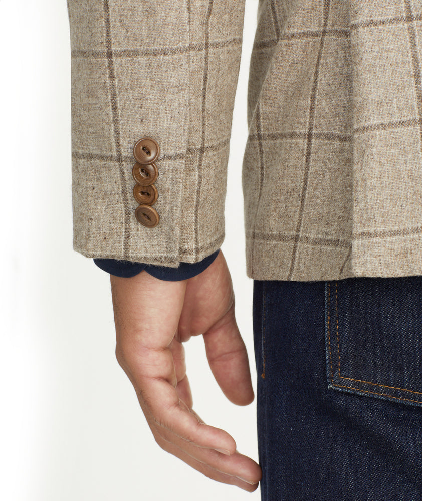 Model is wearing UNTICKit Italian Wool Blend Graydy Sport Coat in Tan Windowpane Check.