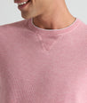 Model is wearing UNTUCKit Greene Crewneck  in Hthr Pink.