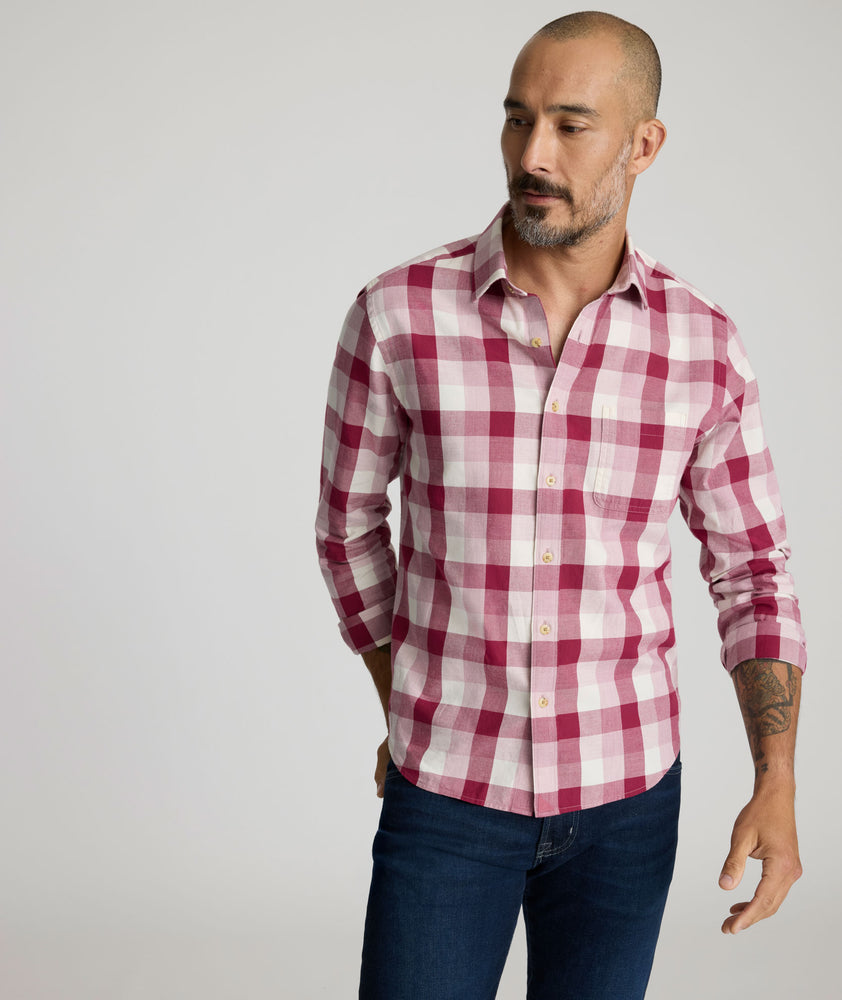Model is wearing UNTUCKIt Greenwald Flannel in pink.