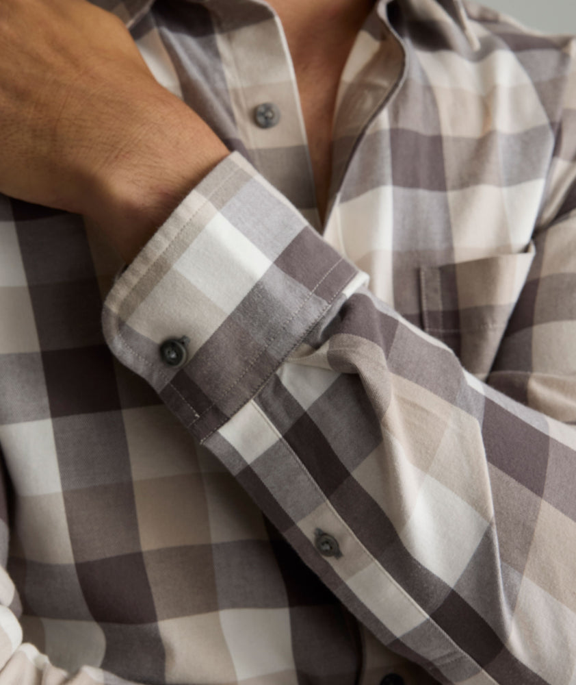 Model is wearing UNTUCKIt Greenwald Flannel in brown.