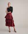 Model is wearing UNTUCKit Gretl plaid skirt. 