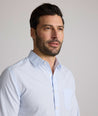 Model is wearing UNTUCKit Halstead wrinkle-free shirt.