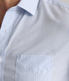 Model is wearing UNTUCKit Halstead wrinkle-free shirt.