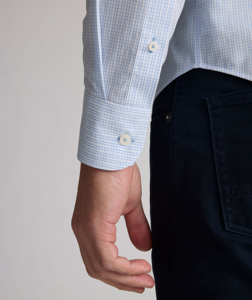 Model is wearing UNTUCKit Halstead wrinkle-free shirt.