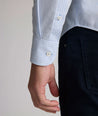 Model is wearing UNTUCKit Halstead wrinkle-free shirt.