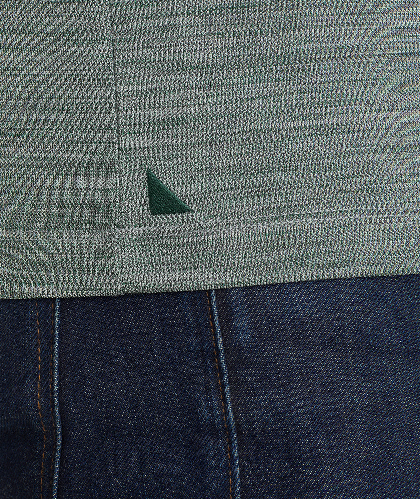 Model wearing an UNTUCKit Dark Green No Sweat Heathered Polo