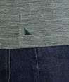 Model wearing an UNTUCKit Dark Green No Sweat Heathered Polo