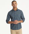 Model is wearing UNTUCKit Wrinkle-Free Harwin Shirt in Navy & Gold Multi Plaid.