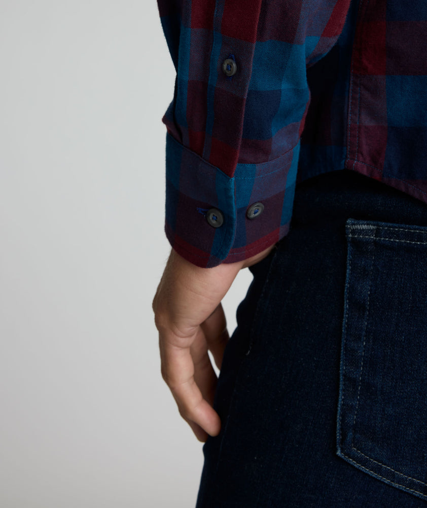 Model is wearing UNTUCKit Heinrich flannel in plaid blue. 