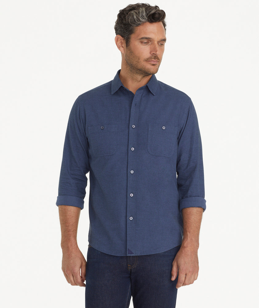 Model is wearing UNTUCKit Flannel Hemsworth Shirt in blue.