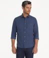 Model is wearing UNTUCKit Flannel Hemsworth Shirt in blue.