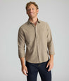 Model is wearing UNTUCKit Hemsworth in brown. 